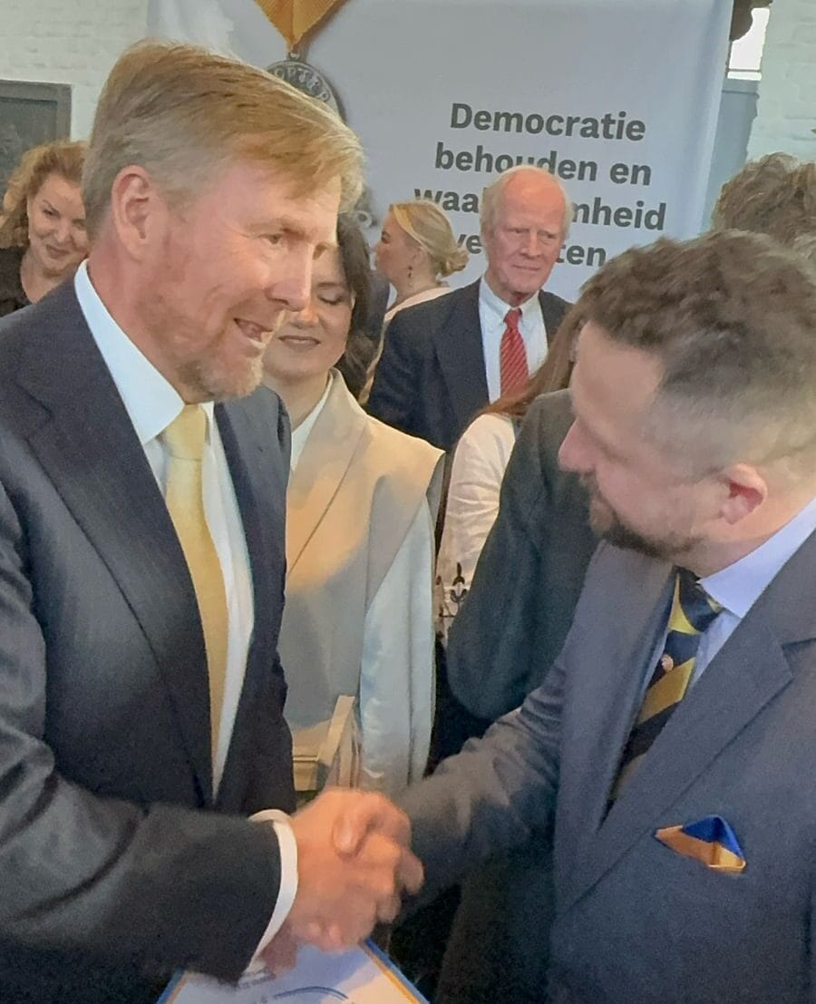 Oekraïense Dalfsenaar Alexei Tryfonov ontmoette koning Willem- Alexander